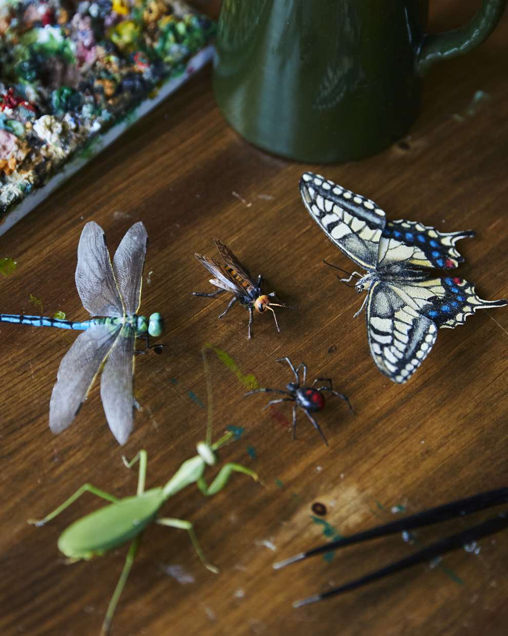 Hannah Lemon, Miniature detailed sculpture of insects including a butterfly, dragonfly and grasshopper. Created from Air drying clay, paper, wood, paint, mixed media.  